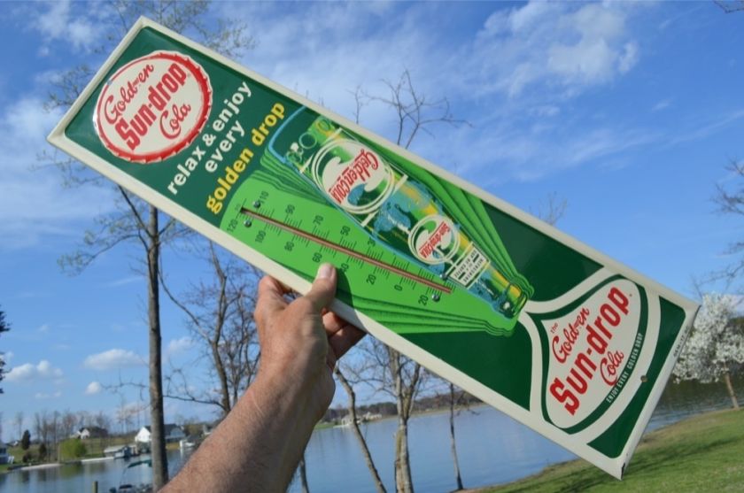   beautiful almost 50 year old golden cola sun drop thermometer is as