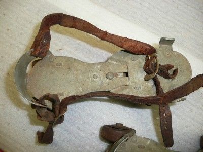 vintage metal roller skates with leather strap antique  